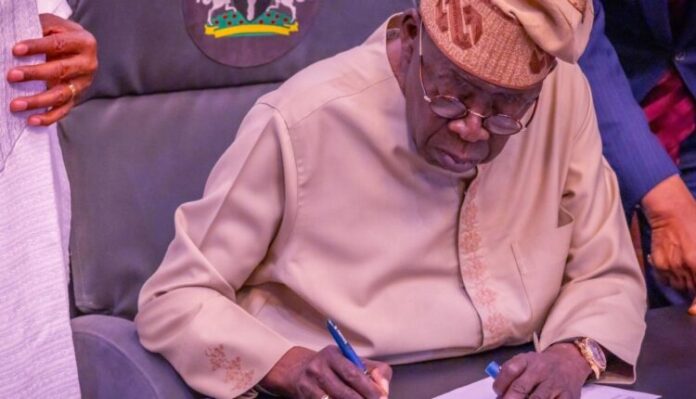 Bola Tinubu signs 750x430