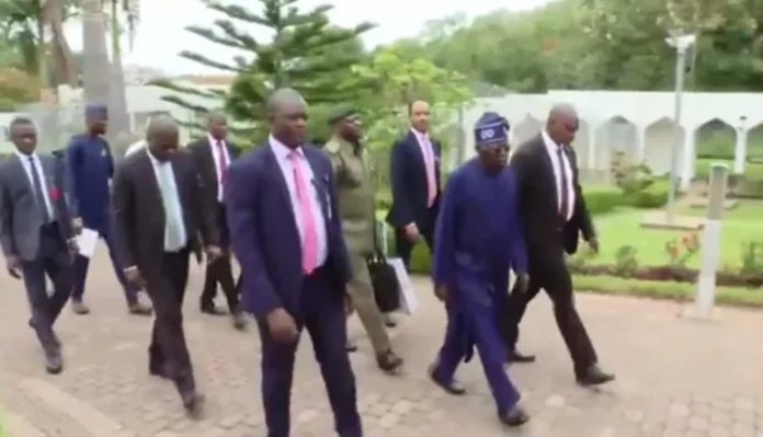 Bola Tinubu walking 750x430
